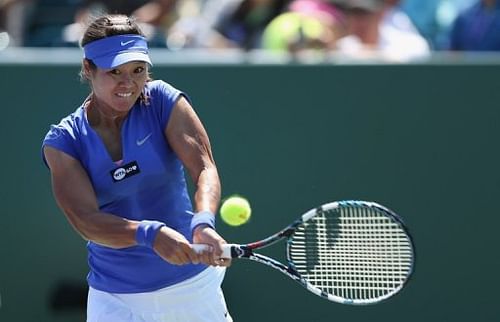 Li Na of China plays a backhand to Kiki Bertens of Netherlands, March 21, 2013 in Key Biscayne, Florida