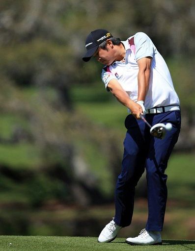 John Huh plays his tee shot at the par 5, 16th hole, in Orlando, on March 21, 2013