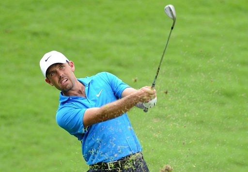 Charl Schwartzel plays a stroke at the Maybank Malaysian Open in Kuala Lumpur on March 22, 2013