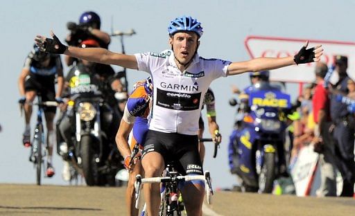 Irish Daniel Martin of the Garmin-Cervelo team celebrates as he crosses the finish line on August 28, 2011