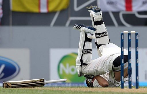 New Zealand&#039;s Tim Southee rolls over after making a run, at Eden Park in Auckland, on March 23, 2013