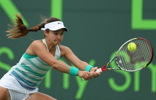 Lauren Davis plays a backhand to Madison Keys at Crandon Park Tennis Center on March 22, 2013