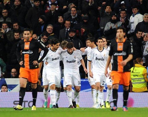 Real Madrid&#039;s players celebrate during the Copa del Rey at the Santiago Bernabeu Stadium, Madrid, January 15, 2013