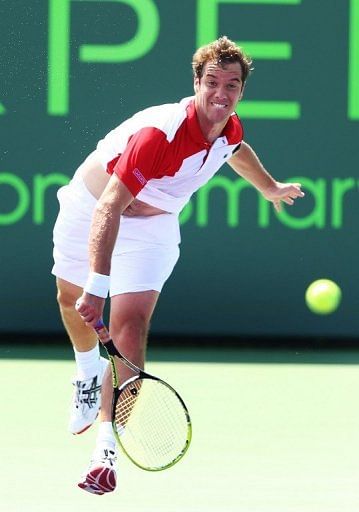 Richard Gasquet of France returns a shot to Oliver Rochus of Belguim, March 23, 2013 in Key Biscayne, Florida