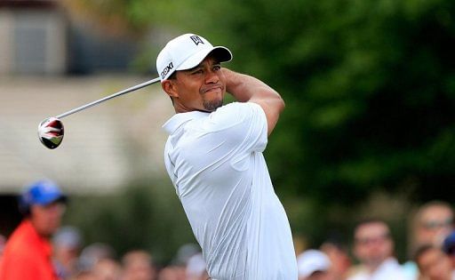 Tiger Wodds of the United States plays his tee shot at the 1st hole at Bay Hill Golf and Country Club on March 23, 2013