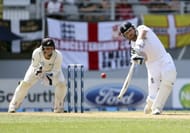 England's Matt Prior (R) bats, watched by New Zealand's BJ Watling, in Auckland, on March 24, 2013