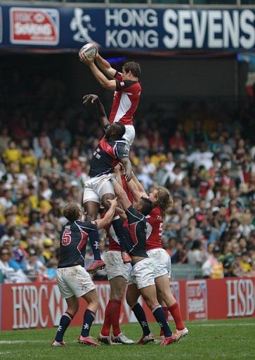 Hong Kong (blue) and Canada (red) compete in a line-out during the Hong Kong Rugby Sevens, on March 23, 2013