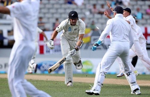 New Zealand&#039;s Peter Fulton (C) makes his ground for a single run, in Auckland, on March 24, 2013