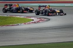 Malaysian GP: Vettel snatches controversial win from Webber