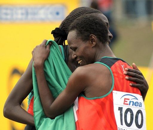 Kenya&#039;s Emily Chebet (right) and Linet Chepkwemoi Masai in Bydgoszcz, Poland on March 28, 2010.