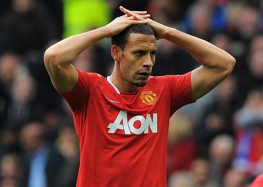 Manchester United defender Rio Ferdinand reacts at Old Trafford in Manchester, north-west England on April 22, 2012
