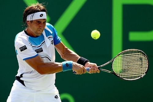 David Ferrer returns a shot to Fabio Fognini on March 24, 2013 in Key Biscayne