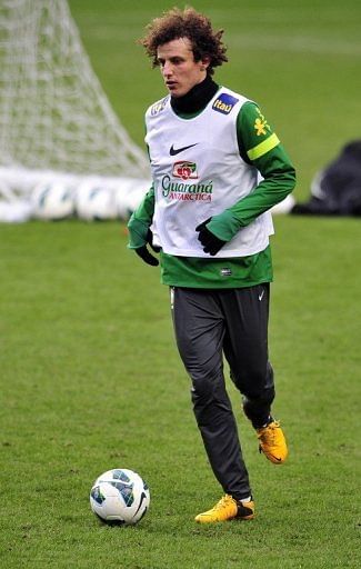 Brazil defender David Luiz is pictured during a team training session in London on March 24, 2013