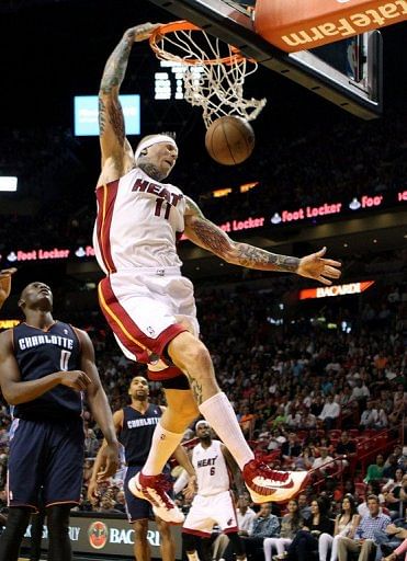 Miami Heat forward Chris Anderson dunks during their NBA game against the Charlotte Bobcats on March 24, 2013
