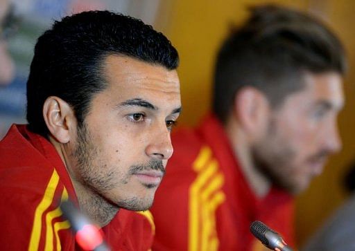 Spain forward Pedro gives a press conference in Paris, on March 25, 2013
