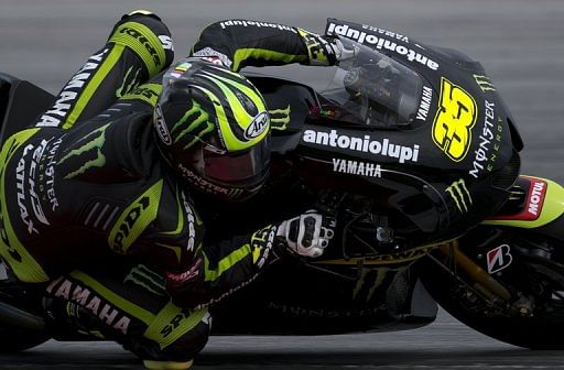Yamaha MotoGP rider Cal Crutchlow powers his bike at the Sepang circuit outside Kuala Lumpur on February 5, 2013