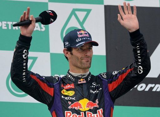 Mark Webber on the podium after finishing second at the Malaysia Grand Prix in Sepang on March 24, 2013