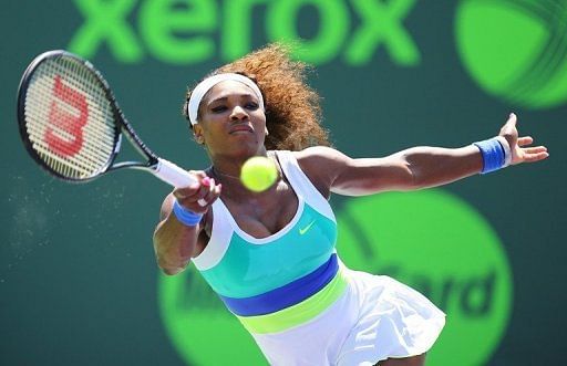 Serena Williams returns a shot against Li Na on March 26, 2013