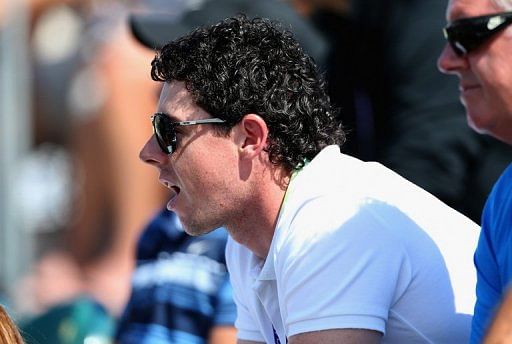 Rory McIlroy watches his girlfriend Caroline Wozniacki at Crandon Park Tennis Center on March 21, 2013 in Key Biscayne
