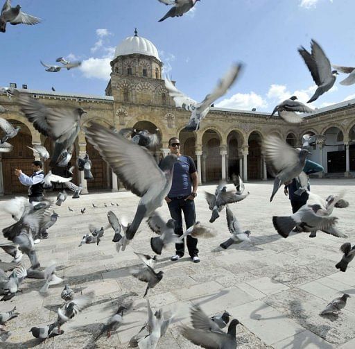 Oussama Mellouli poses in the Kasbah square in Tunis on March 22, 2013