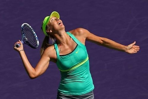 Maria Sharapova hits a smash against Sara Errani at the Miami Masters on March 27, 2013