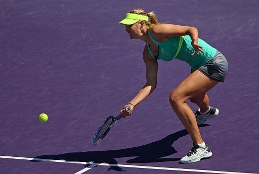 Maria Sharapova scoops out a forehand at the Miami Masters on March 27, 2013