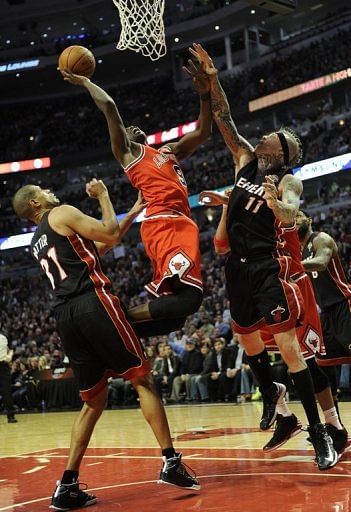 Luol Deng of the Chicago Bulls jumps for the basket on March 27, 2013