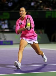 Jelena Jankovic of Serbia plays a backhand to Roberta Vinci at the Miami Masters on March 27, 2013