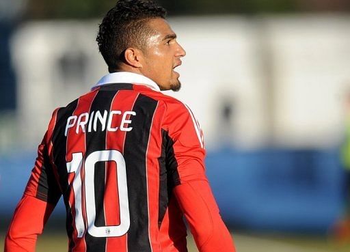 AC Milan&#039;s Kevin-Prince Boateng shouts towards fans during his side&#039;s friendly against Pro Patria, January 3, 2013