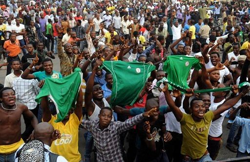 Fans celebrate Nigeria football team&#039;s victory over Ivory Coast on February 3, 2013 in Lagos