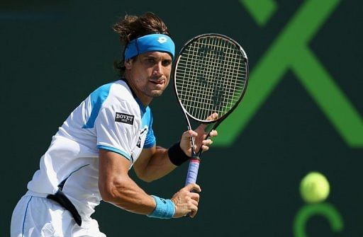 David Ferrer lines up a backhand against Tommy Haas at the Miami Masters on March 29, 2013