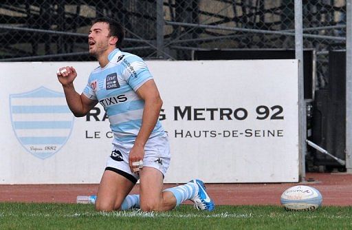 Racing Metro&#039;s fullback Juan-Martin Hernandez celebrates scoring a try against Perpignan, in Colombes, on March 23, 2013