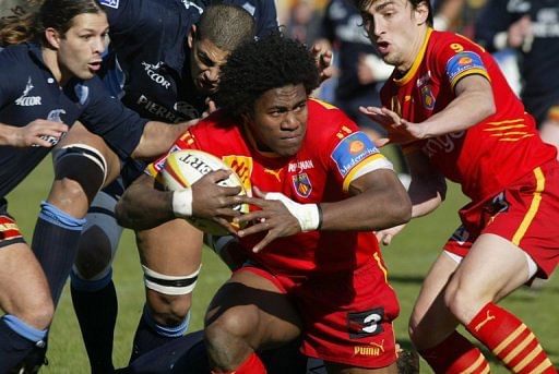 Samueli Naulu (C), during the French Top 14 rugby match on February 18, 2006, at the Aime Giral Stadium in Perpignan