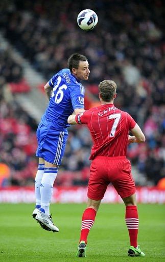 Chelsea&#039;s English defender John Terry (L) vies with Southampton&#039;s English striker Rickie Lambert (R) on March 30, 2013