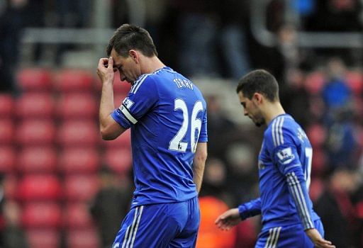 Chelsea defender John Terry (L) and midfielder Eden Hazard trudge off after the defeat at Southampton on March 30, 2013