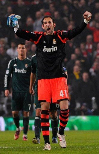 Real Madrid goalkeeper Diego Lopez celebrates victory over Manchester United on March 5, 2013