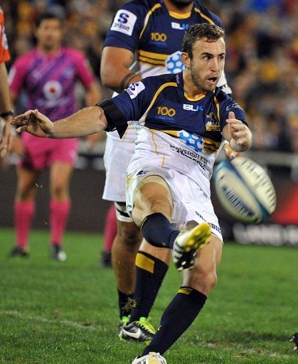 Nic White of the Brumbies kicks the ball during a match against the Northern Bulls, in Canberra, on March 30, 2013
