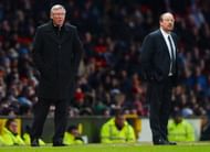 Manchester United manager Alex Ferguson (L) and Chelsea's Spanish manager Rafael Benitez look on during the English FA Cup quarter-final football match between Manchester United and Chelsea at Old Trafford, Manchester, northwest England on March 10, 2013. The match ended 2-2.