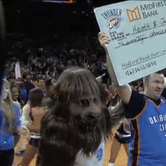 Fan wins $20,000 after sinking a half-court shot; help fight wife's cancer