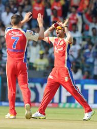 RCB player Henriques celebrating after the wicket of Yusuf Pathan of KKR during the IPL match between RCB v/s KKR at Chinnaswamy Stadium,in Bangalore on Thursday 11th April 2013