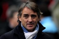 MANCHESTER, ENGLAND - JANUARY 08: Manchester City Manager Roberto Mancini looks on prior to the FA Cup Third Round match between Manchester City and Manchester United at the Etihad Stadium on January 8, 2012 in Manchester, England. (Photo by Alex Livesey/Getty Images)