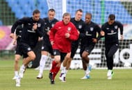 England manager Roy Hodgson warms up with the team during an England training session during UEFA Euro 2012 on June 13, 2012 in Krakow, Poland. (Photo by Scott Heavey/Getty Images)