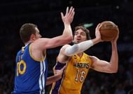 Pau Gasol #16 of the Los Angeles Lakers is defended by David Lee #10 of the Golden State Warriors in the first half at Staples Center on April 12, 2013 in Los Angeles, California. NOTE TO USER: User expressly acknowledges and agrees that, by downloading and or using this photograph, User is consenting to the terms and conditions of the Getty Images License Agreement. (Photo by Jeff Gross/Getty Images)
