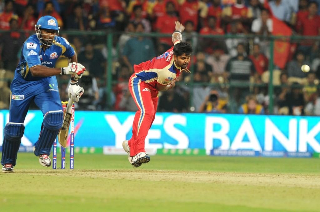 RCB players celebrate fall of wicket during a match between RCB and MI in Bangalore on April 4, 2013. (Photo: IANS)