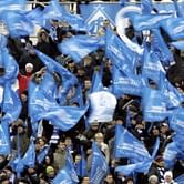 Their image tainted, Russian football fans fight back
