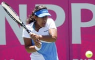 Ankita Bhambri of India returns against