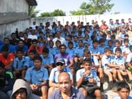 School kids attending a Dempo game at the Duler Stadium
