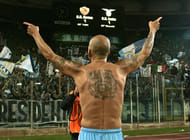 Manager: football team of tattooed players