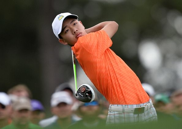 Tianlang Guan of China plays during the second round of the 77th Masters golf tournament at Augusta National Golf Club on April 12, 2013 in Augusta, Georgia