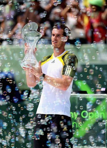 Andy Murray holds the trophy on March 31, 2013 in Key Biscayne